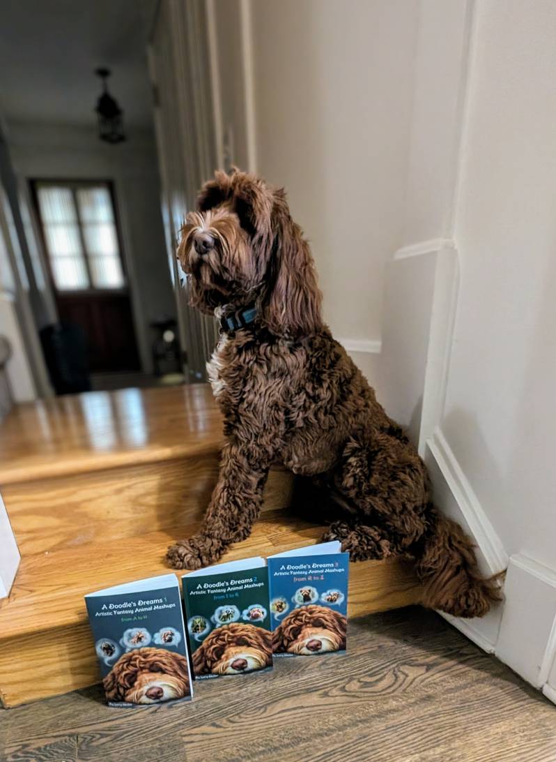 Lucy the Labradoodle, author of A Doodle's Dreams, sitting with her three books